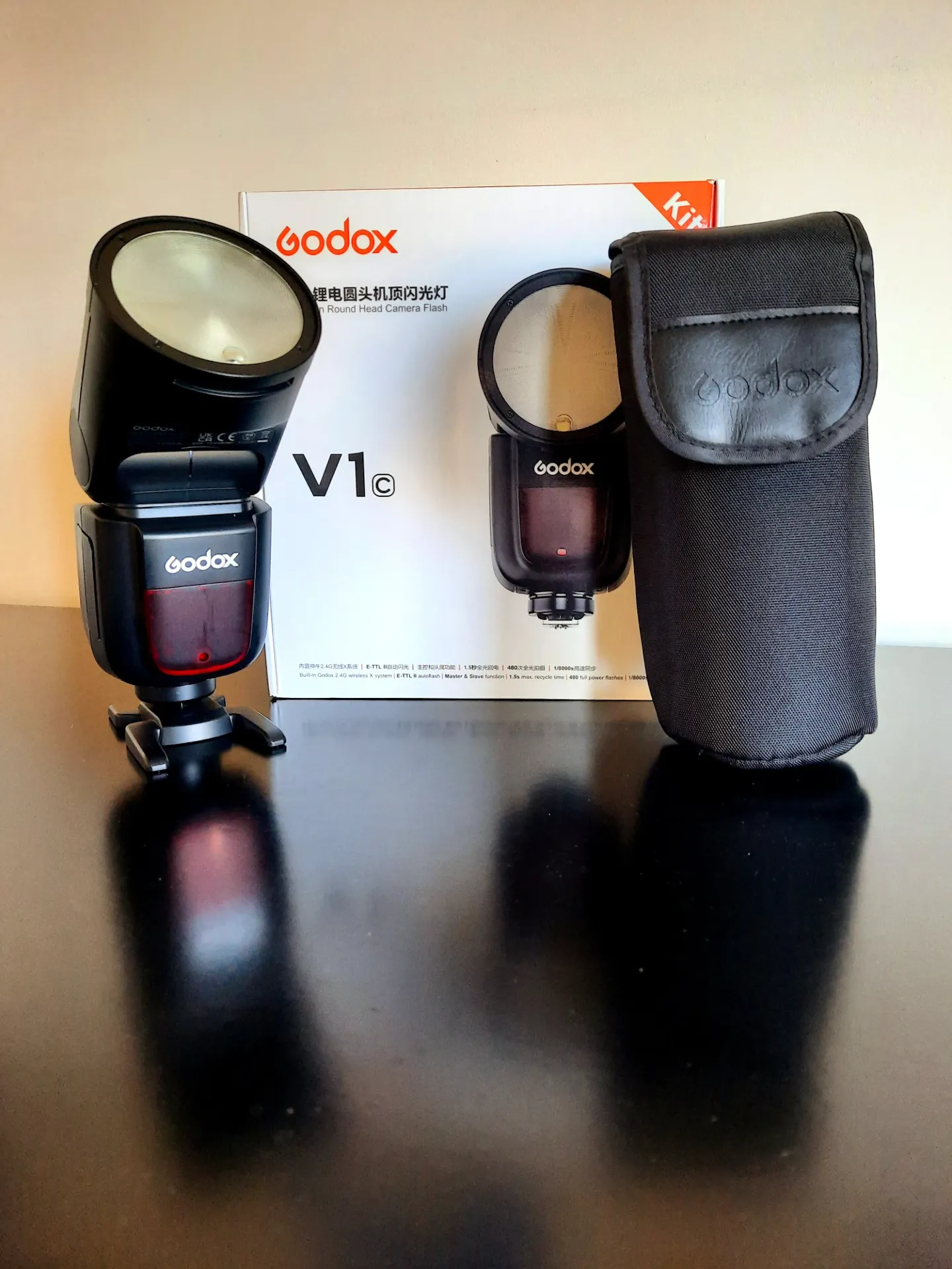 Godox (canon) V1 flitser kit + battery + batterylader met kabel + opberghoes